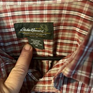 Red and tan button down Eddie Bauer light weight shirt.
